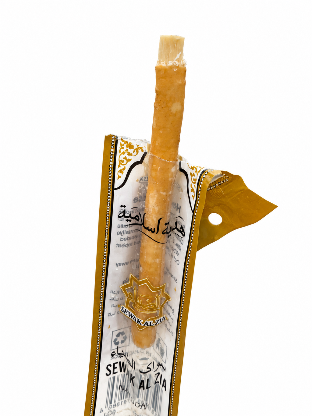 Sewak Al Zia Golden Miswak partially removed from its wrapper, showing the natural Peelu wooden stick and exposed tip.