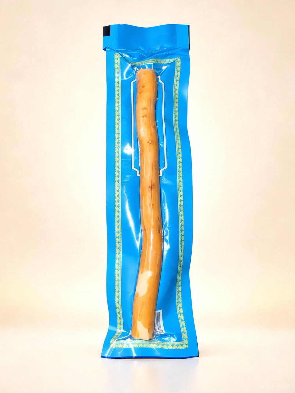 Single 6-inch natural Peelu Miswak stick individually packed in blue Al-Emaan Sewak wrapping with a clear viewing window.