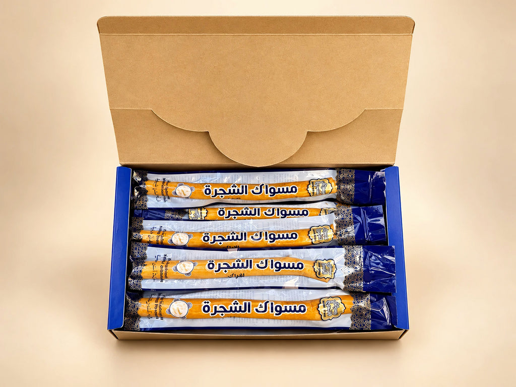 Open Siwak Al-Shajrah retail box displaying individually wrapped premium 8-inch Golden Miswak sticks.